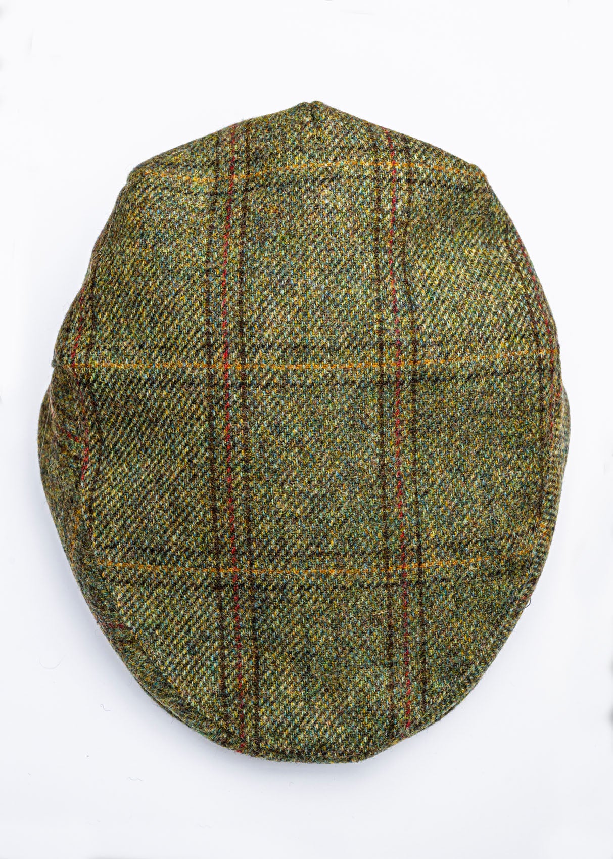 Green checkered flat cap on a white background