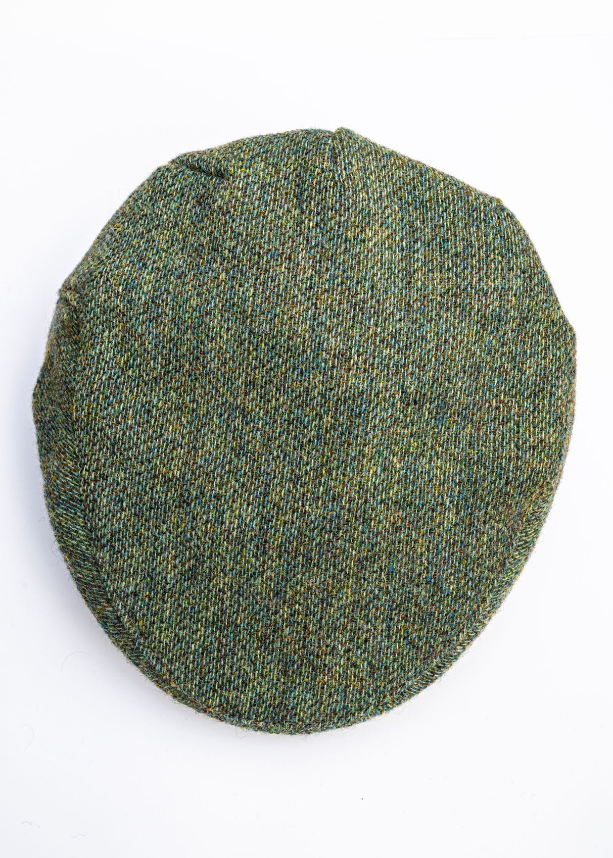 Green textured fabric sample on a white background